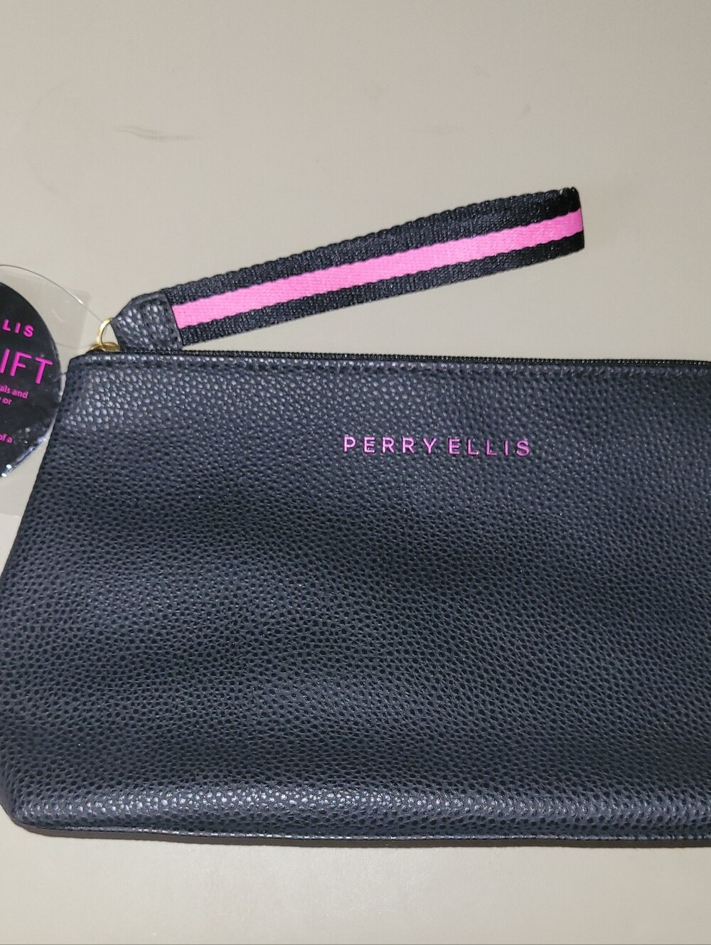 NWT - Perry Ellis Black Wristlet with Pink Trim.